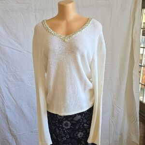 FA Cream V-Neck Sweater with Sparkling Trim. Small Stain On The Sleeve